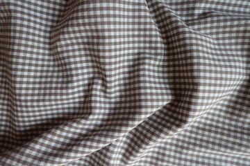 Rippled cotton fabric with grey and white gingham pattern