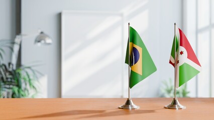 FLAGS OF BRAZIL AND BURUNDI ON TABLE