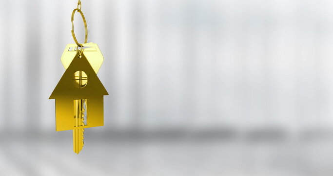 Golden house keychain image over blurred background
