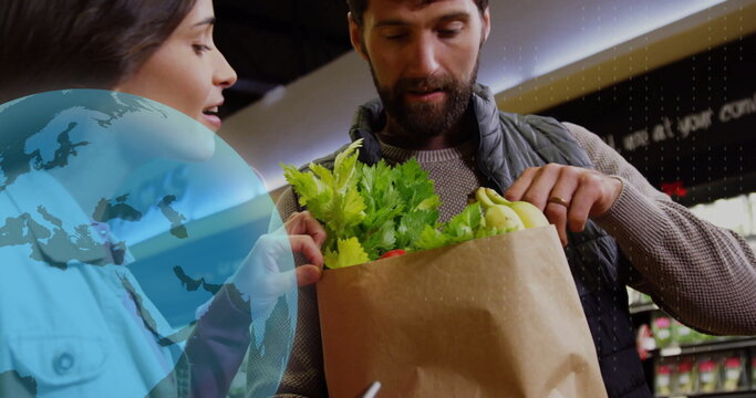 Image of data processing with icons over caucasian couple grocery shopping - Powered by Adobe