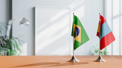 FLAGS OF BRAZIL AND MONGOLIA ON TABLE