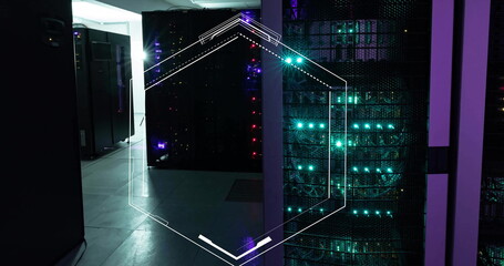 Image of hexagonal scanner frame over glowing computer servers in server room