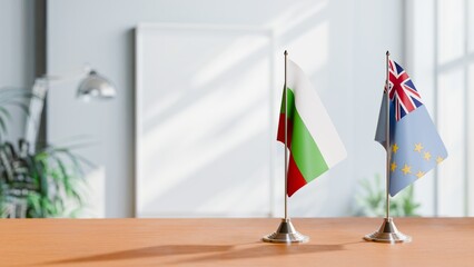 FLAGS OF BULGARIA AND TUVALU ON TABLE