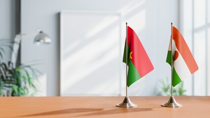 FLAGS OF BURKINA-FASO AND NIGER ON TABLE