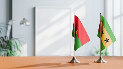 FLAGS OF BURKINA-FASO AND SAO TOME ON TABLE