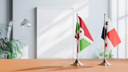 FLAGS OF BURUNDI AND PANAMA ON TABLE