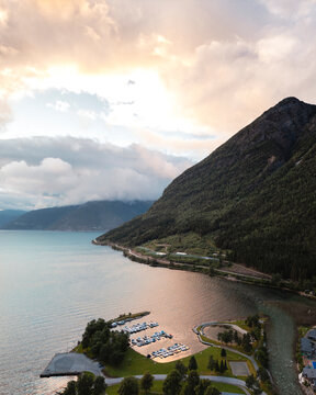 Aerial drone view of Fjord near Kinsarvik during susnet in Hardangervidda National Park, Norway