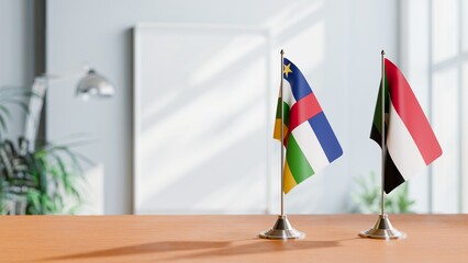 FLAGS OF CENTRAL AFRICAN REPUBLIC AND SUDAN ON TABLE