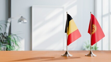 FLAGS OF CHAD AND KYRGYZSTAN ON TABLE