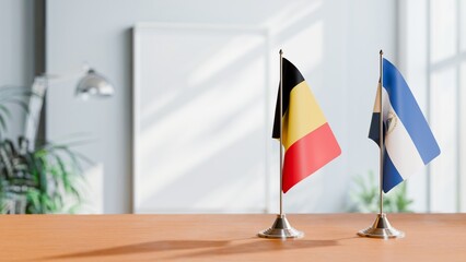 FLAGS OF CHAD AND NICARAGUA ON TABLE