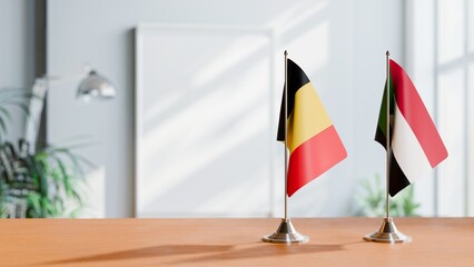 FLAGS OF CHAD AND SUDAN ON TABLE