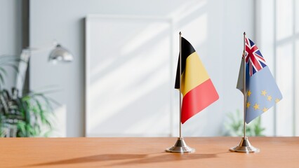 FLAGS OF CHAD AND TUVALU ON TABLE