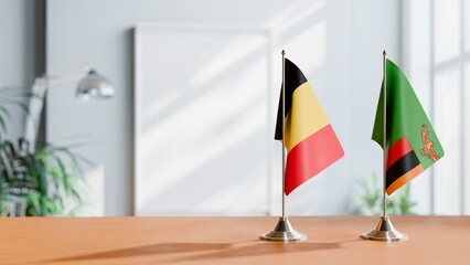 FLAGS OF CHAD AND ZAMBIA ON TABLE