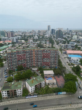 Aerial view of bustling downtown skyline with modern high-rise buildings and busy streets, Lagos, Nigeria.