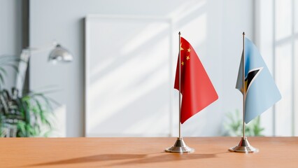 FLAGS OF CHINA AND SAINT LUCIA ON TABLE