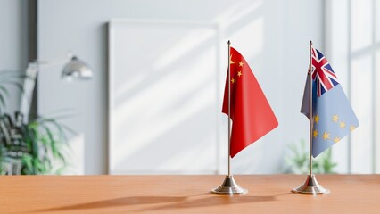 FLAGS OF CHINA AND TUVALU ON TABLE