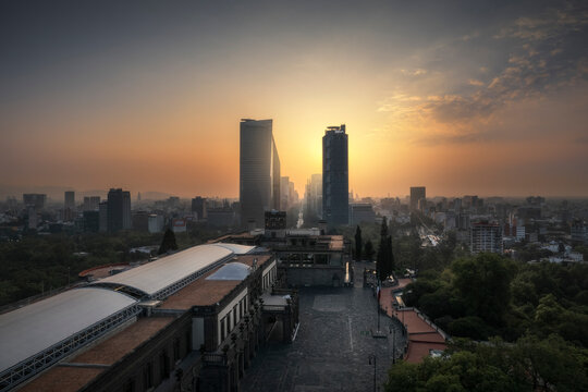 Aerial view of the skyline with skyscrapers and Castillo de Chapultepec park at sunrise, Miguel Hidalgo, Mexico.
