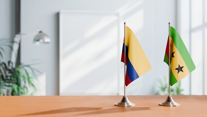 FLAGS OF COLOMBIA AND SAO TOME ON TABLE