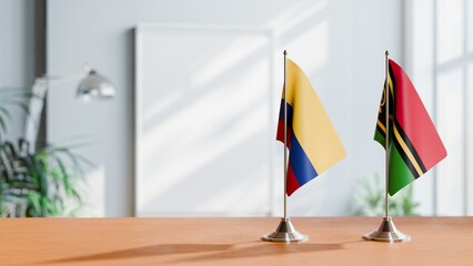 FLAGS OF COLOMBIA AND VANUATU ON TABLE