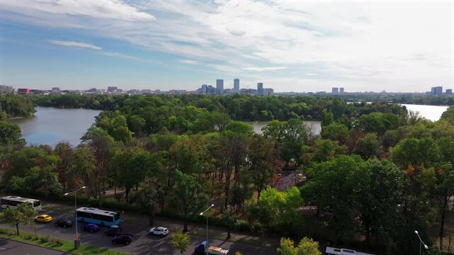 Northern part of Bucharest from above. Aerial cityscape 4k video with Bucharest, Romania, next to Arch of Triumph, Herastrau Lake and Free Press Square (Piata Presei Libere in Romanian). Visit Romania
