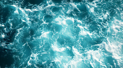 Fototapeta premium A Close-Up View of Ocean Water with White Foam and Bubbles, Creating a Textured and Abstract Background