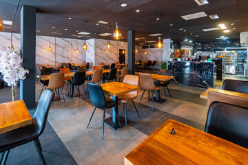 Empty wood table with blur interior outdoor space coffee restaurant or cafe for background