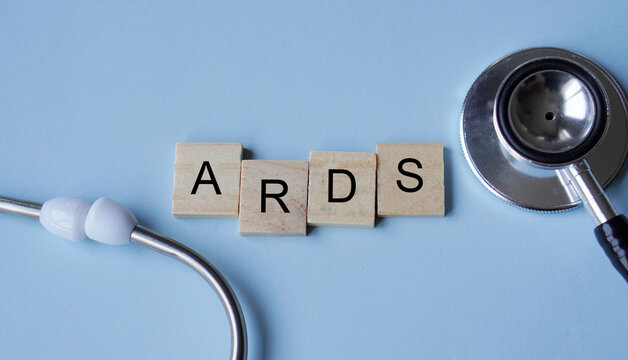 ARDS, Acute respiratory distress syndrome, wooden letters with stethoscope. medicine concepts