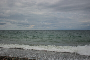 Waves on the beach. Bad weather at sea.