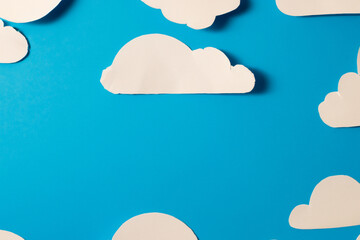 Paper with clouds in blue and white on a. Sky cloud light concept. Clouds in blue and white on a white. Paper with clouds in white and blue on lifestyle a.
