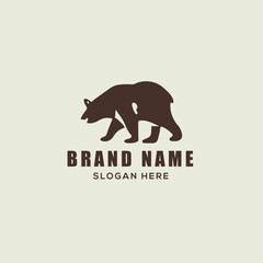 Obraz premium Minimalist Bear and Mountain Logo Design