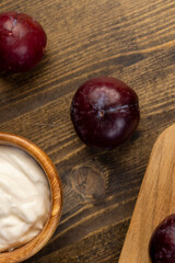 red ripe plum during cooking and slicing