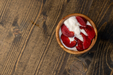 yogurt made from milk and red ripe plum