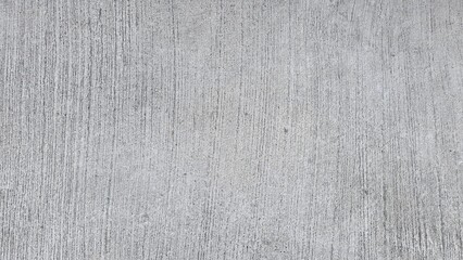 Texture of old gray concrete wall. Background image of gray cement floor and walls. Lines on concrete road, white background. Close-up photo. Top view photo.