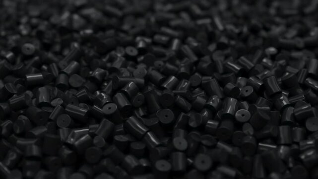 Fly around pile of black plastic polypropylene granules, masterbatch polymer grain. HDPE or PVC resin pellets. 3d render animation