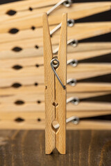 a group of wooden clothespins for drying clothes