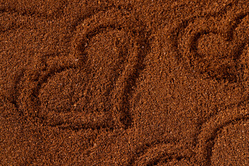 a large amount of ground coffee powder close-up