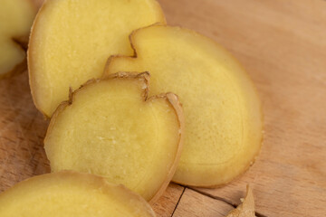 details of the ginger root used in cooking sliced into pieces
