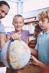 Fototapeta premium World map, teacher and kids with globe, pointing and answers with knowledge, intelligent and talk. Geography, woman and students in school, children or studying with happiness, questions and learning