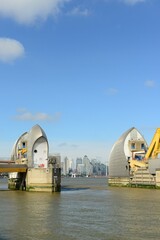 The London Thames flood barrier, England, U.K. On a calm sunny September day with the barriers down.