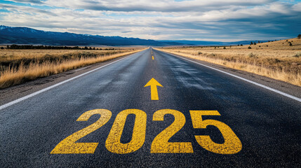 long, straight road stretching toward the horizon with "2025" painted in large yellow numbers on the asphalt. An arrow points forward, symbolizing progress and the future