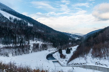 Ostravice river bellow Sance dam in winter Moravskoslezske Beskydy mountains in Czech republic