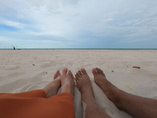 feet on the beach