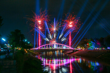 Beautiful Fireworks and light Chan Palace bridge over the Nan River New Landmark It is a major tourist  in the VIJITR PHITSANULOK event is Public places attraction Phitsanulok,Thailand.