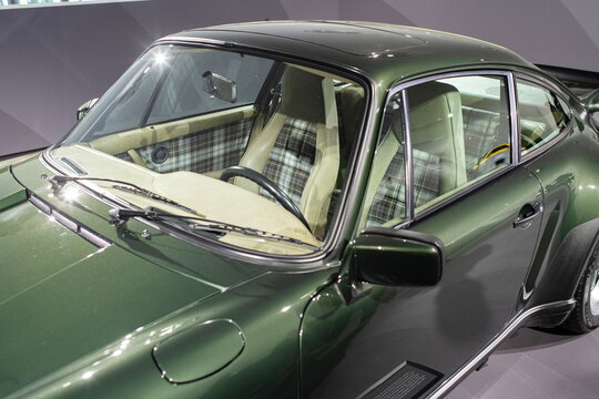 14-09-2024, Stuttgart, Germany. Porsche Museum.1976 Type 930 Porsche 911 turbo 3.0 coupe in green with green leather and tartan interior upholstery
