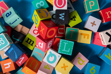 A colorful jumble of alphabet blocks spelling out the words of childhood