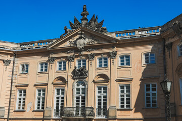 Historic architecture of a grand building in Warsaw during a clear blue sky