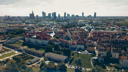 Fototapeta premium Aerial view of Warsaw showcasing historic architecture and modern skyline during a clear daytime