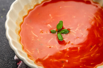 Tomato soup with vermicelli gazpacho first course dish fresh delicious gourmet food background on the table rustic food top view copy space keto and paleo diet Vegetarian and vegan food