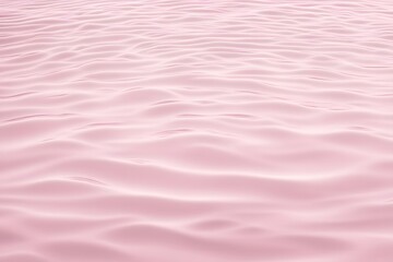 Obraz premium A soft pastel pink water ripple background with delicate ripples across the surface, AI Generated