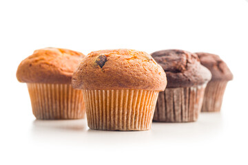 Sweet muffin cakes isolated on white background.